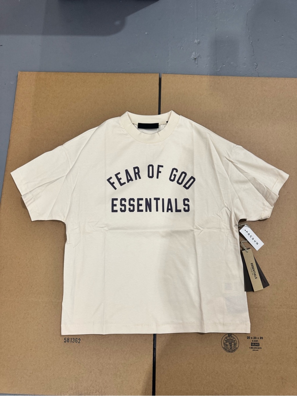 Fear of God Essentials Short Sleeve Tee - Cream with Black Print